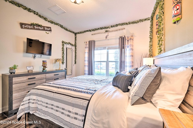 bedroom featuring a textured ceiling