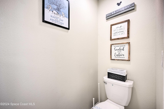 bathroom featuring toilet