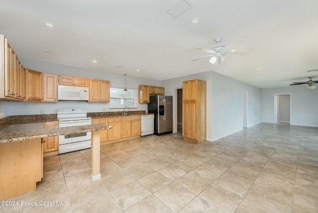 kitchen with ceiling fan, white appliances, sink, and light brown cabinetry