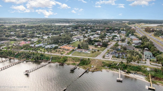 3109 Indian River Dr, Cocoa, FL 32922 - aerial overview of property's location with a nearby body of water and nearby suburban area