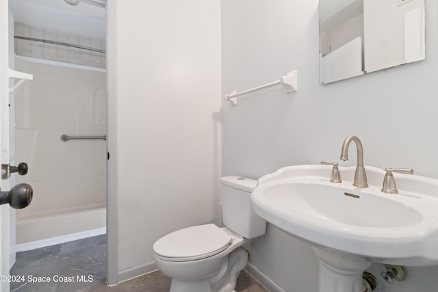 bathroom featuring sink and toilet