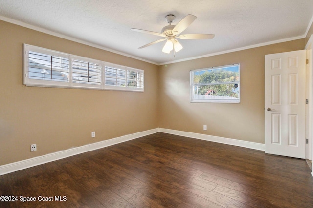 unfurnished room with dark wood-type flooring, a textured ceiling, ceiling fan, and crown molding