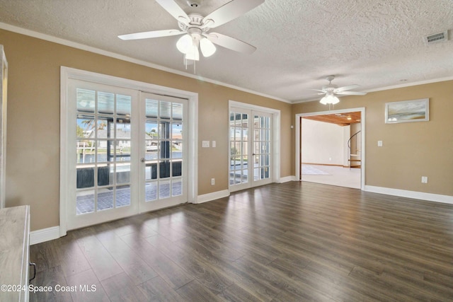 interior space with ceiling fan, a textured ceiling, french doors, crown molding, and dark hardwood / wood-style flooring