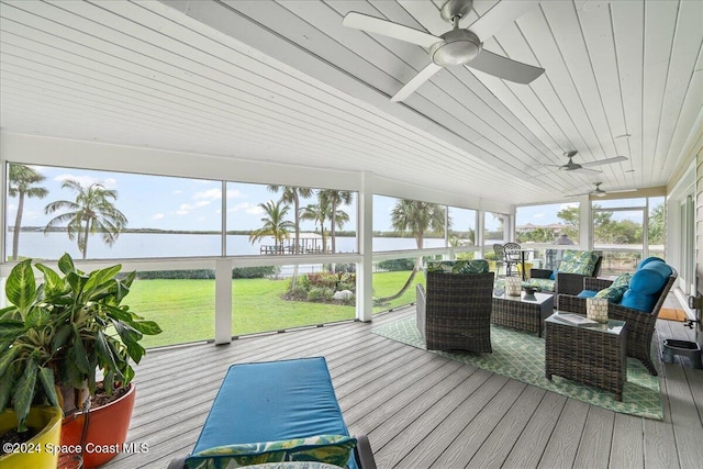 sunroom / solarium with ceiling fan and wood ceiling