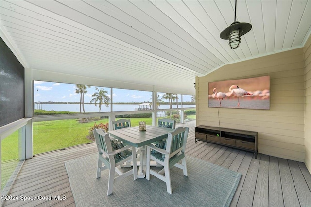 sunroom featuring wooden ceiling, vaulted ceiling, and a water view