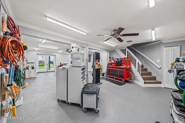 basement featuring a workshop area, crown molding, french doors, and ceiling fan