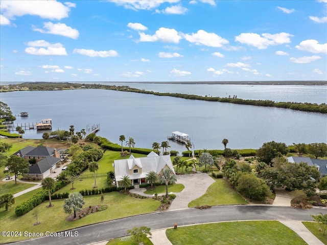 drone / aerial view with a water view