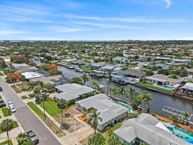 bird's eye view with a water view