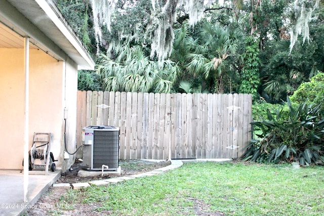 view of yard with central AC unit