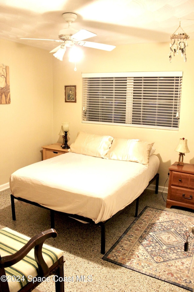 139 W Laila Dr W, Melbourne, FL 32904 - bedroom with baseboards and a ceiling fan