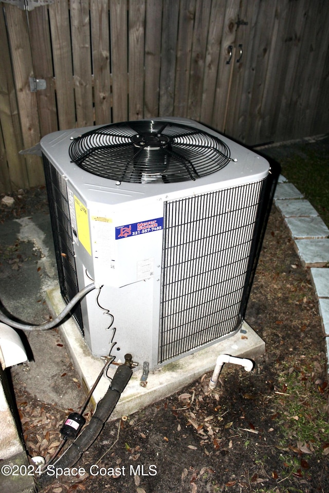 139 W Laila Dr W, Melbourne, FL 32904 - exterior view of central air condition unit and pet washing station
