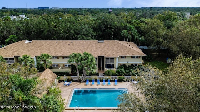 view of swimming pool featuring a patio area