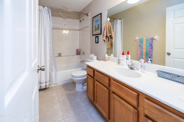 full bathroom with toilet, vanity, tile patterned flooring, and shower / bathtub combination with curtain