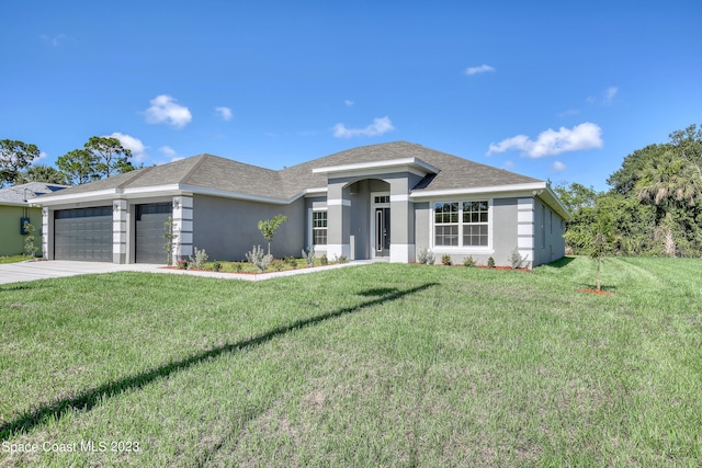 prairie-style house with a garage and a front lawn