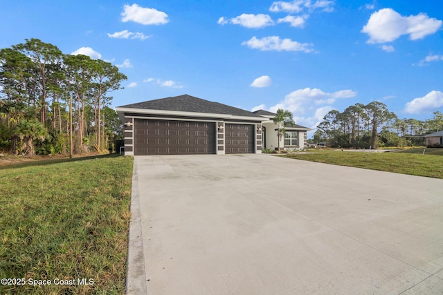 ranch-style home featuring a garage and a front lawn