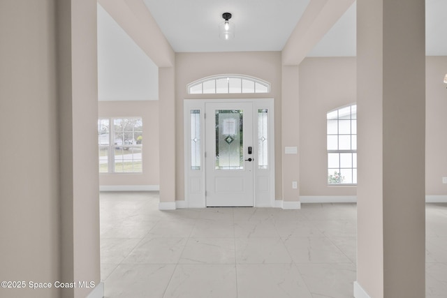 entrance foyer featuring a wealth of natural light