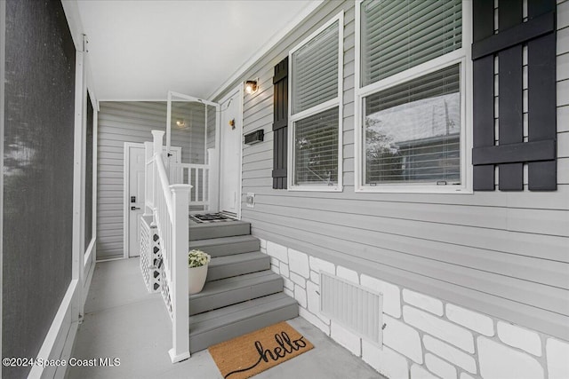 property entrance featuring covered porch