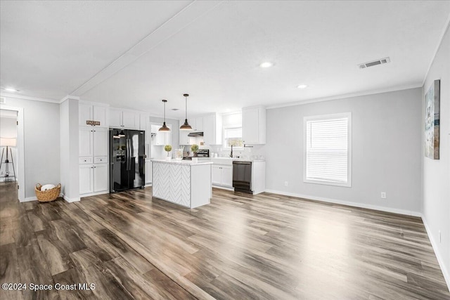 kitchen with black appliances, white cabinetry, dark wood-type flooring, and decorative light fixtures