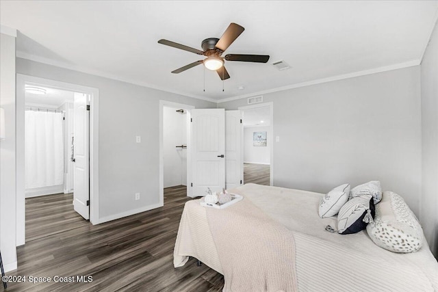 bedroom with dark wood-type flooring, ceiling fan, and crown molding