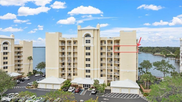 view of building exterior featuring a water view