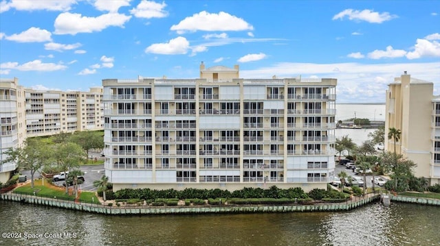 view of building exterior featuring a water view