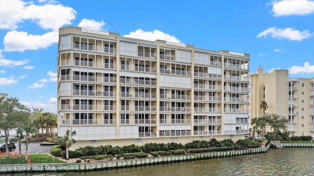 view of building exterior featuring a water view