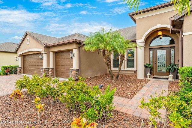 property entrance featuring a garage