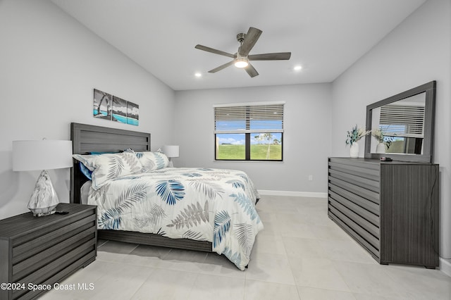 bedroom featuring ceiling fan and light tile patterned floors