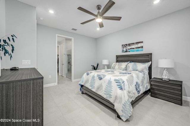 bedroom with ensuite bath and ceiling fan