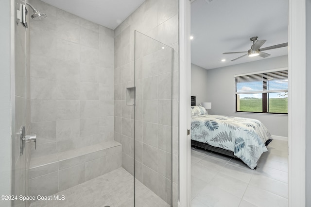 bathroom featuring tile patterned floors, ceiling fan, and a tile shower