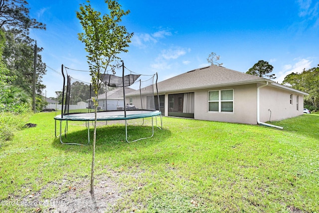 view of yard featuring a trampoline