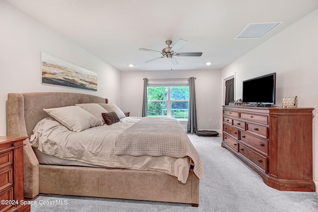 carpeted bedroom featuring ceiling fan