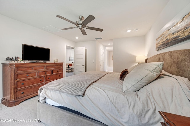 carpeted bedroom with ceiling fan