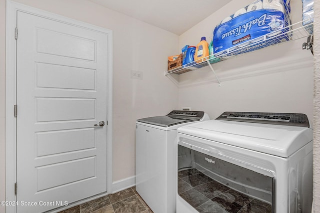 clothes washing area featuring washing machine and clothes dryer