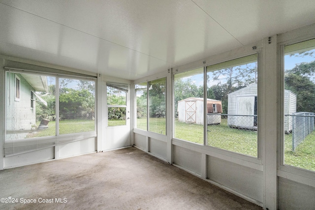 unfurnished sunroom with a wealth of natural light