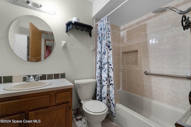 full bathroom with shower / bath combo, toilet, and vanity