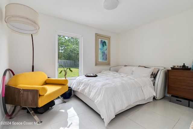 bedroom with light tile patterned floors