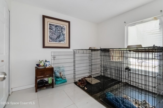 bathroom with tile patterned floors and a wealth of natural light