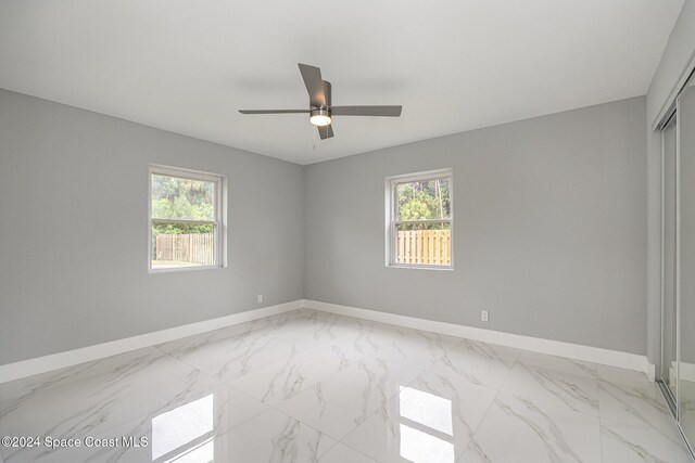 empty room with ceiling fan