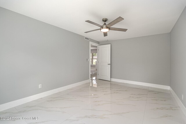 empty room with ceiling fan