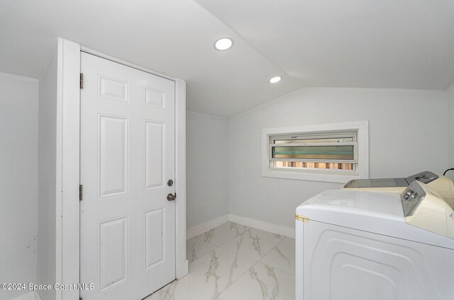 laundry room with washing machine and dryer