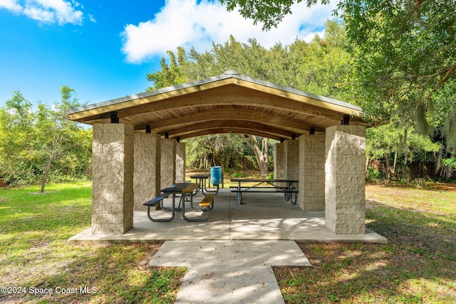 view of home's community with a gazebo and a lawn