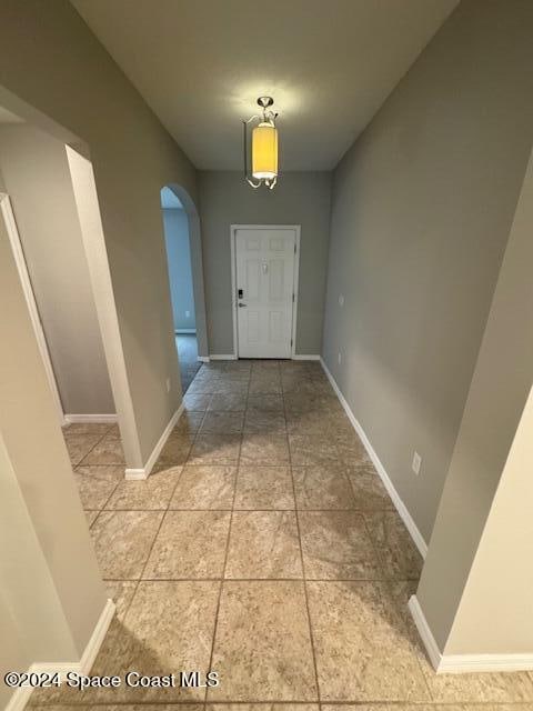 interior space featuring tile patterned flooring