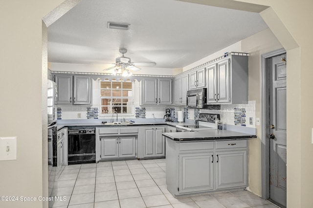 kitchen featuring sink, ceiling fan, gray cabinetry, and black appliances