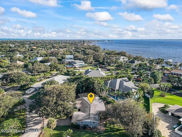 birds eye view of property featuring a water view