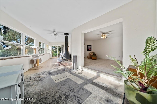 interior space featuring ceiling fan