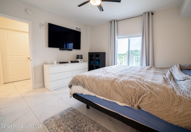 bedroom featuring ceiling fan