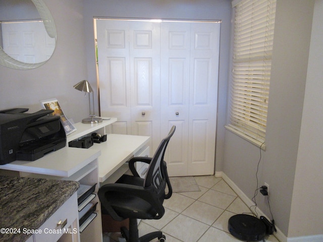 office area featuring light tile patterned flooring