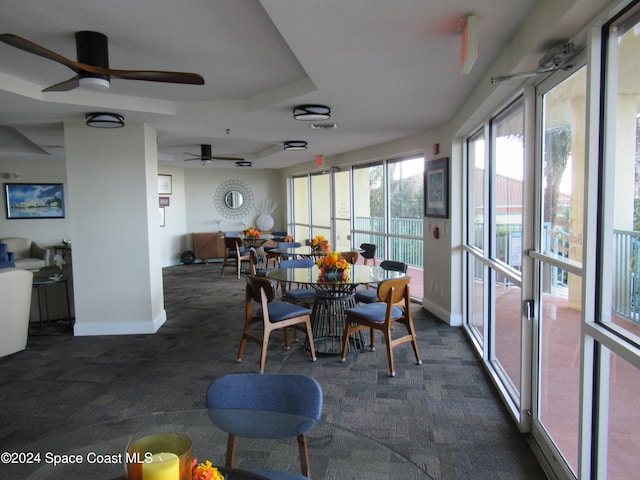 sunroom with a tray ceiling