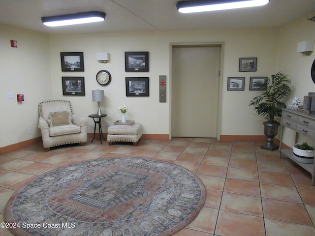 sitting room with light tile patterned flooring